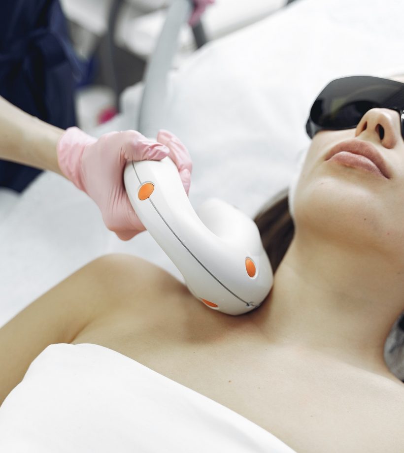 Woman in cosmetology studio on laser hair removal